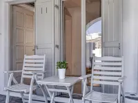 Paolas Town Hotels near Glam Club