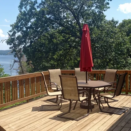 Experience Kentucky Lake out the back door! Spacious 4-bedroom retreat awaits.