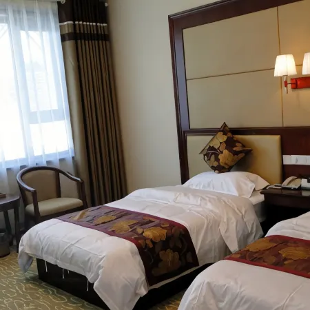 Xi Zhi Ha Zhi Hotel Отели в г. Сунань