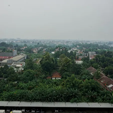 Modern and Relax Studio Room at Serpong Greenview Apartment by Travelio