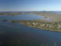 Absolute lake front - lie in bed & listen to the fish jump!