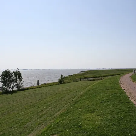 near the dyke (30m) and green beach, sea water swimming pool