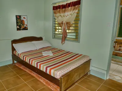 Basio's Place Tourist Inn by RedDoorz