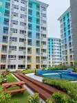 Spacious 36Sqm Studio with 65" TV Netflix Karaoke and Pool Access Near Airport and Samal Ferry