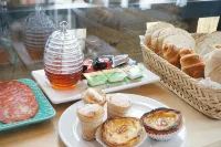 Muralha Charm House - petit déjeuner