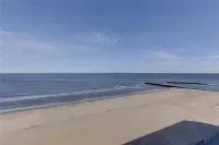 Coastal Beach condo with indoor pool, ocean views, steps to the beach