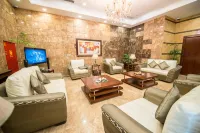 Centaurus Hotel Suites - Homestays