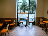 Fangli International Apartment (Shunde Overseas Chinese City Happy Coast Branch) - Condos