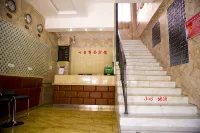 Shawan Qixing Business Hotel - parking