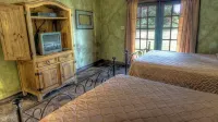 6-bedroom Lodge on 12 acres in Concan, Texas.  Swimming pool & hot tub.