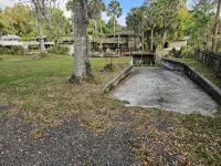 Cozy canal front house with its own boat ramp and dock. Amazing waterfront view. - 3-Star