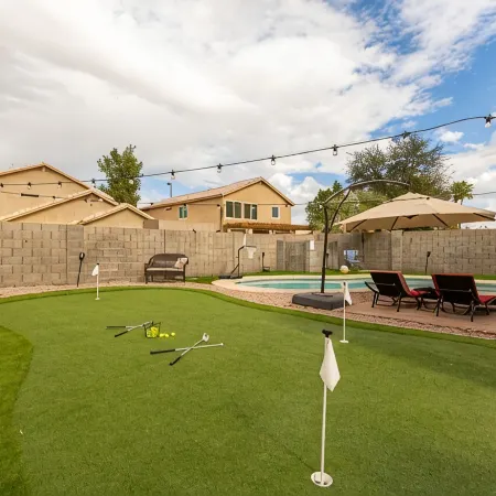 Great location with King Suite, Game Room, HEATED Pool, and Putting Green!
