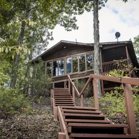 Rustic Lakefront Cabin near Smokies w/ Hot Tub, Firepit, Pool Table + Views!
