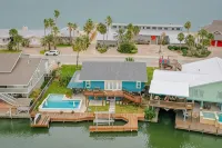 Serene Waterfront 5Br Sleeps 15 w/Heated Pool, Fire Pit, Boat & Jet Ski Lift - 4-Star