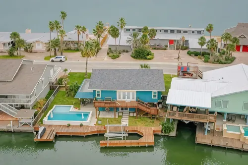 Serene Waterfront 5Br Sleeps 15 w/Heated Pool, Fire Pit, Boat & Jet Ski Lift - 4-Star