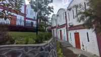 Urbanest Inn Castle Resort Hotels near Likupang