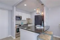 Coastal Beach condo with indoor pool, ocean views, steps to the beach
