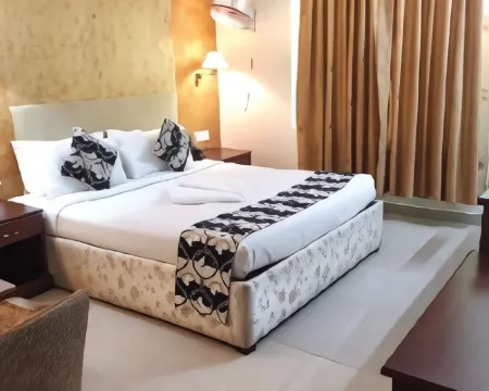 Hotel Bessota International Hotels in Thiruvalla