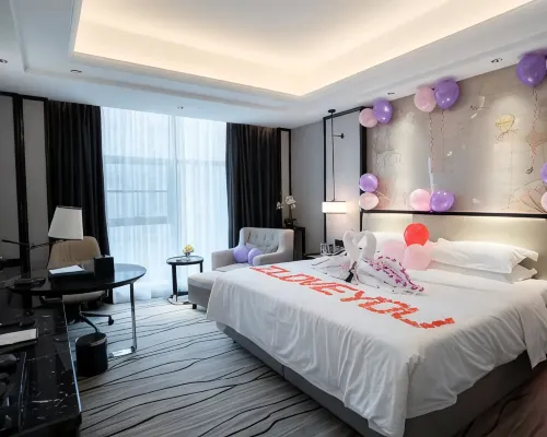 Wellton International Hotel Rooms Photos