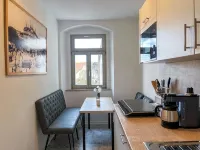Central apartment for 4 people with kitchen, WiFi & private parking space