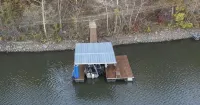 Picturesque 3-bedroom Cabin Hideaway in a wooded setting with a lake view!