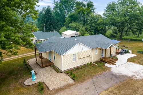 Lake front home with access to two lakes, large yard and RV hookup available!