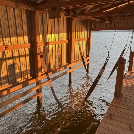 Peaceful lake front home with wrap around porch and relaxing views!
