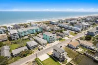 Top-Floor Canal View Condo w/ Pool, Steps to Beach - 4-Star