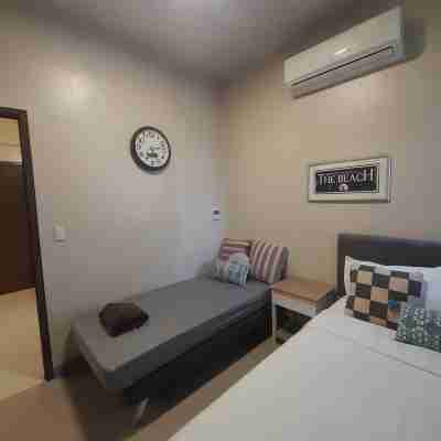 Condo by the Beach Omp Mactan Int'l Airport, 2 Bedrooms/2 Baths Sleeps 7 Guests Rooms