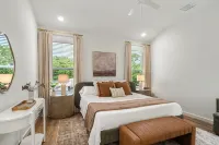 BRAND NEW 4-bedroom, 2 primary suites, heated pool, steps to the beach and river - 4-Star