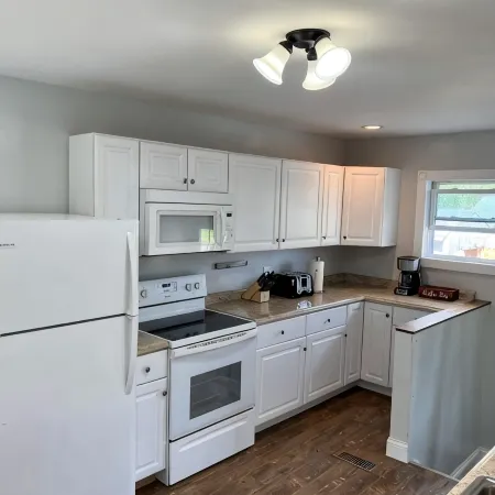 Ranch home with 3 bedrooms upstairs and 1 down. Refurnished June of 2022
