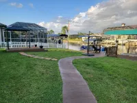 waterfront home, in a canal of the Caloosahatchee River with direct Gulf access. - Homestays