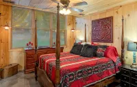 Red Cabin on Kentucky Lake.  Peaceful and pet friendly with a partial lake view. - 3-Star