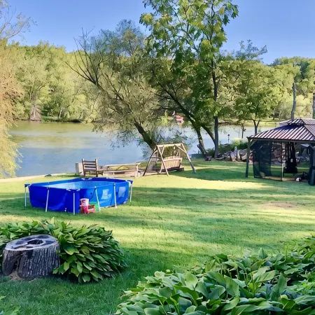 220’ Waterfront Rock River WI Beach Home Deal!Pier Pools FP Fishng Boat & Kayaks