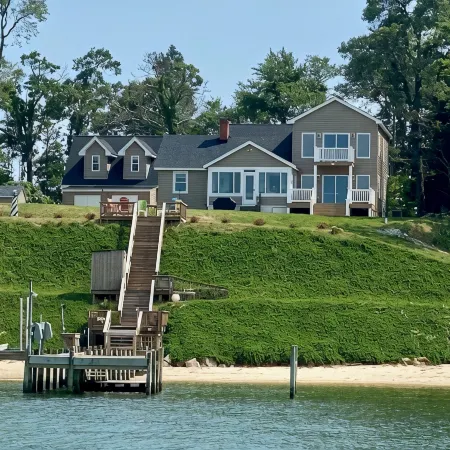 Room on river with sunset views and private beach!