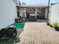 New Era Family Homestay Binjai Mitra RedDoorz Hotels near House of Representatives Building of Binjai City