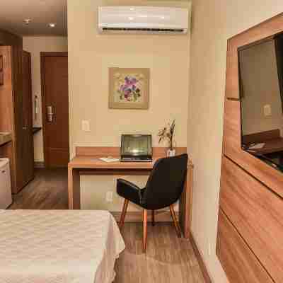 Mont Blanc Suites Duque de Caxias Rooms