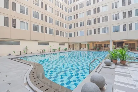 RedDoorz Apartment @ Emerald Towers Bandung Отели рядом с достопримечательностью «Таман Гейсибу Мини»