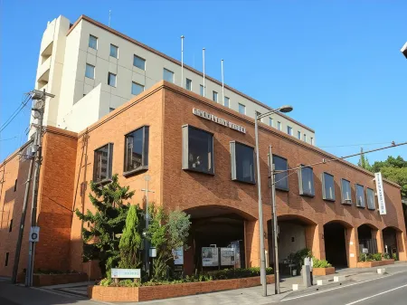 Green Hill Hotel Akashi Отели рядом со станцией JR Okubo station