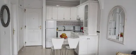 Precioso Apartamento con Piscina Junto al mar