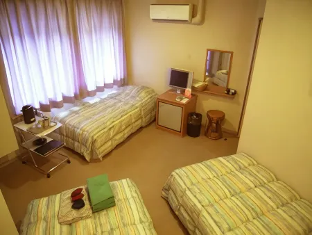 Petit Hotel Yubara Resort Отели в г. Манива