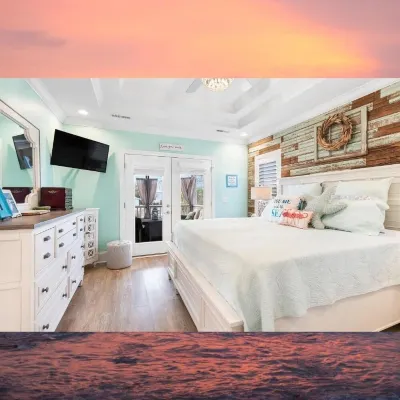 Open concept, charming home on NE 50th with a Salt Water Pool, fenced in.