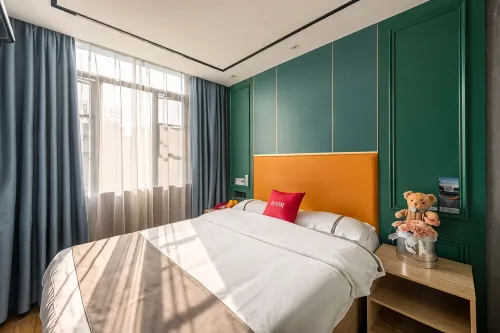 Orange Ke Chain Hotel (Ganzhou Nine Square Shopping Center The Mixc)