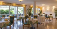 Aparthotel Familiaris - Family Apartments - Pools & Spa in Dolomites