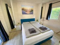 Wassermann vacation home with box-spring beds and large terrace Hotels in Steinhude