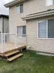 Entire Home in Edmonton South close to Airport with fenced private yard & deck