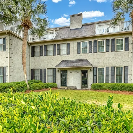 Stones throw from shore! Spacious multi-level townhome one row back from beach