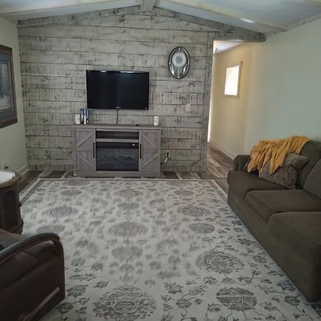 Cozy nestled in quiet neighborhood. On snowmobile and ATV trail.