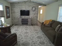 Cozy nestled in quiet neighborhood. On snowmobile and ATV trail.