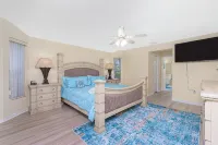 Newly Remodeled 4BR/3BR Canal Front Retreat w/ Pool Near Golf Course & Beach FL - 4-Star